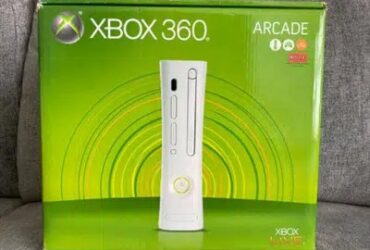 Xbox 360 Falcon with 1 wireless controller 60 games.