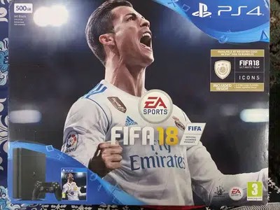 PS4 with controllers and 5 games