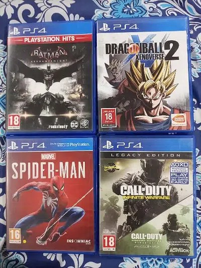 PS4 with controllers and 5 games