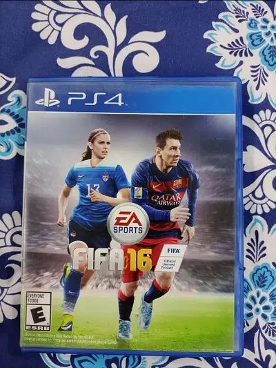 PS4 with controllers and 5 games