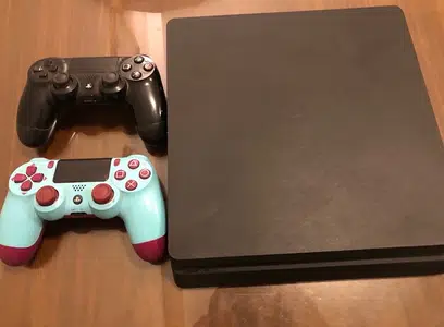 Ps4 with two controllers for sale