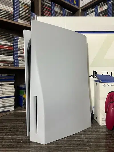 PlayStation 5 / ps5 with 4 games and red controller