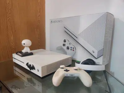 Xbox one s brand new condition with 10 games